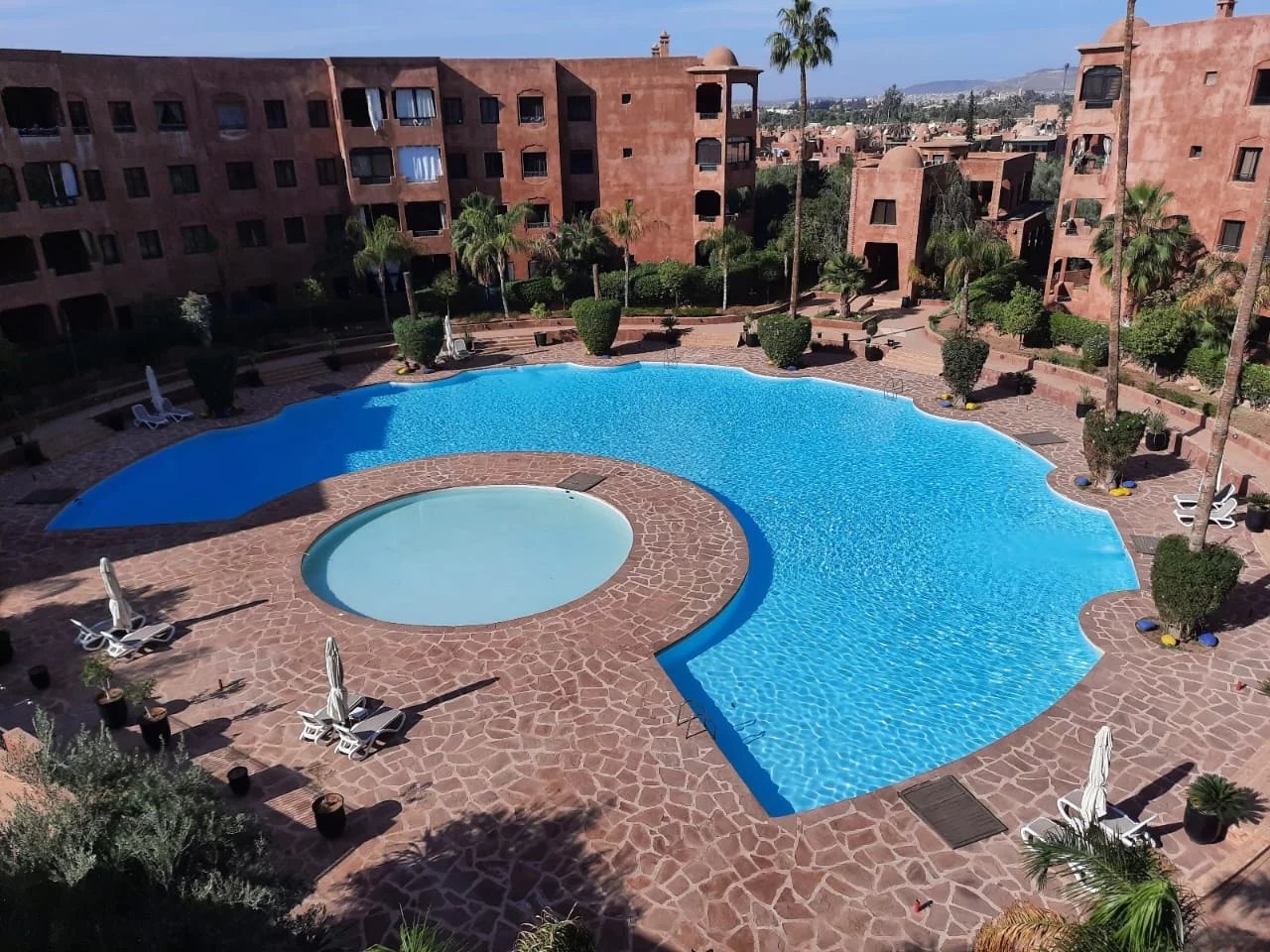 Appartement avec toit-terrasse dans résidence sécurisée à Marrakech